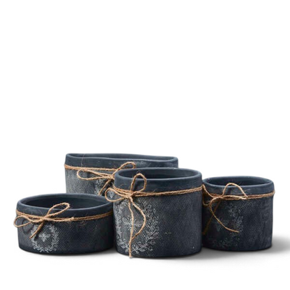 Black ceramic decorative bee bowl with textured finish, white bee motif and natural jute twine bow, perfect for rustic farmhouse and country cottage home décor.