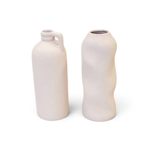 Maison Oie white tall textured jug and matching sculptural vase with a matte finish on a clean white background